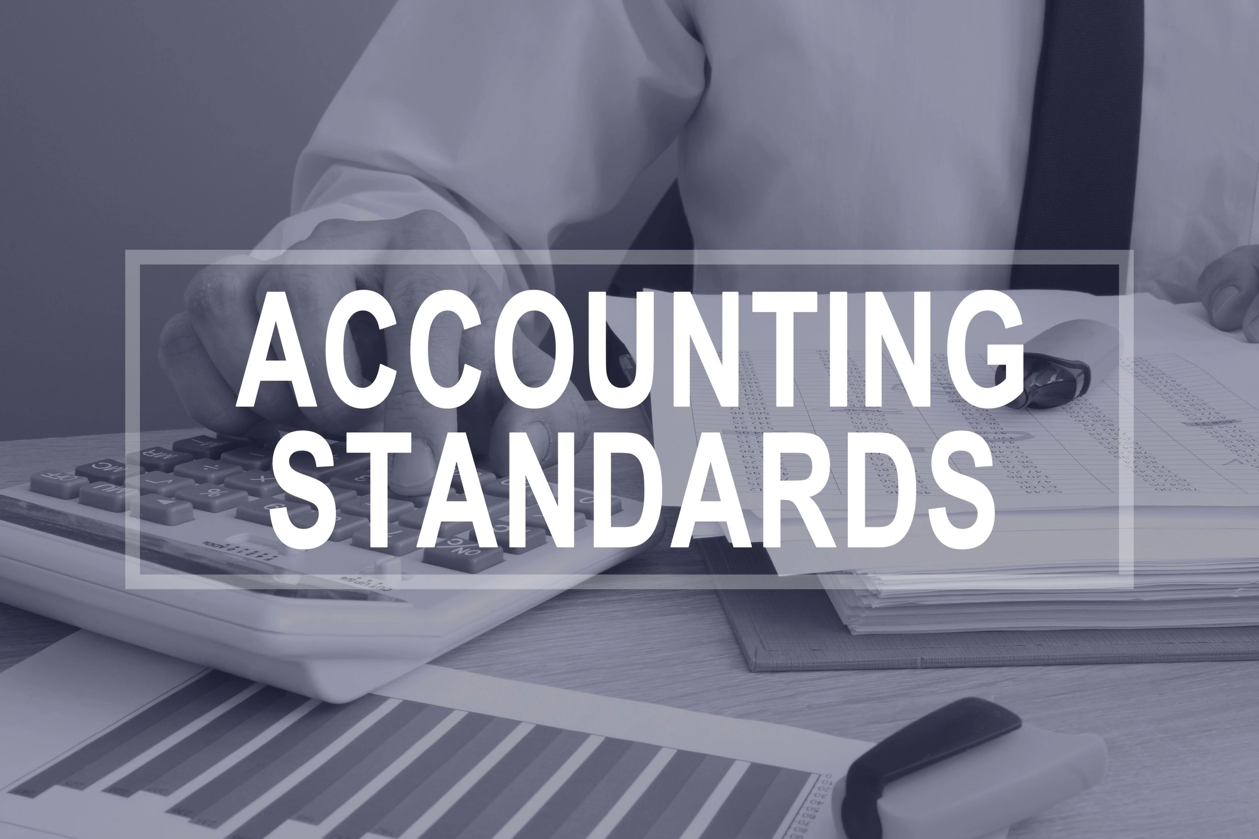 Man preparing accounting standards report